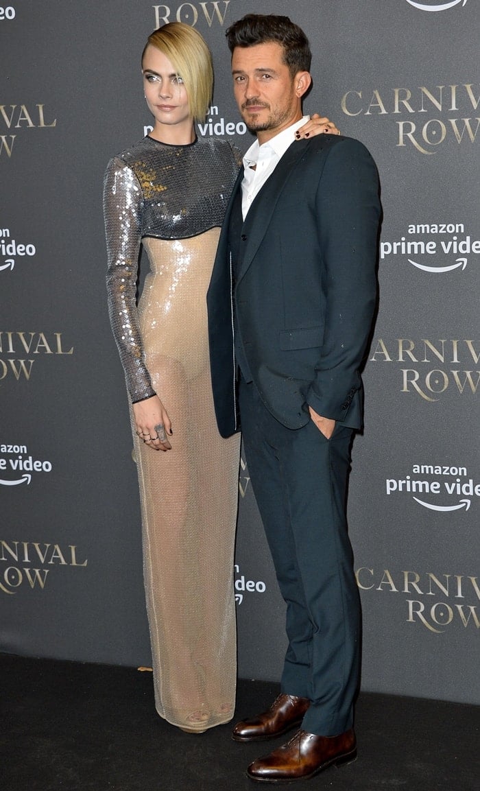 Cara Delevingne and Orlando Bloom looked stunning while posing together on the red carpet at the Carnival Row premiere in Berlin, Germany on August 26, 2019