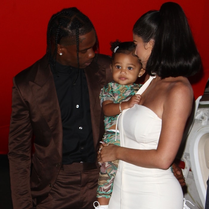 Travis Scott, Kylie Jenner, and their daughter Stormi Webster share a sweet moment at the premiere of Look Mom I Can Fly in Santa Monica