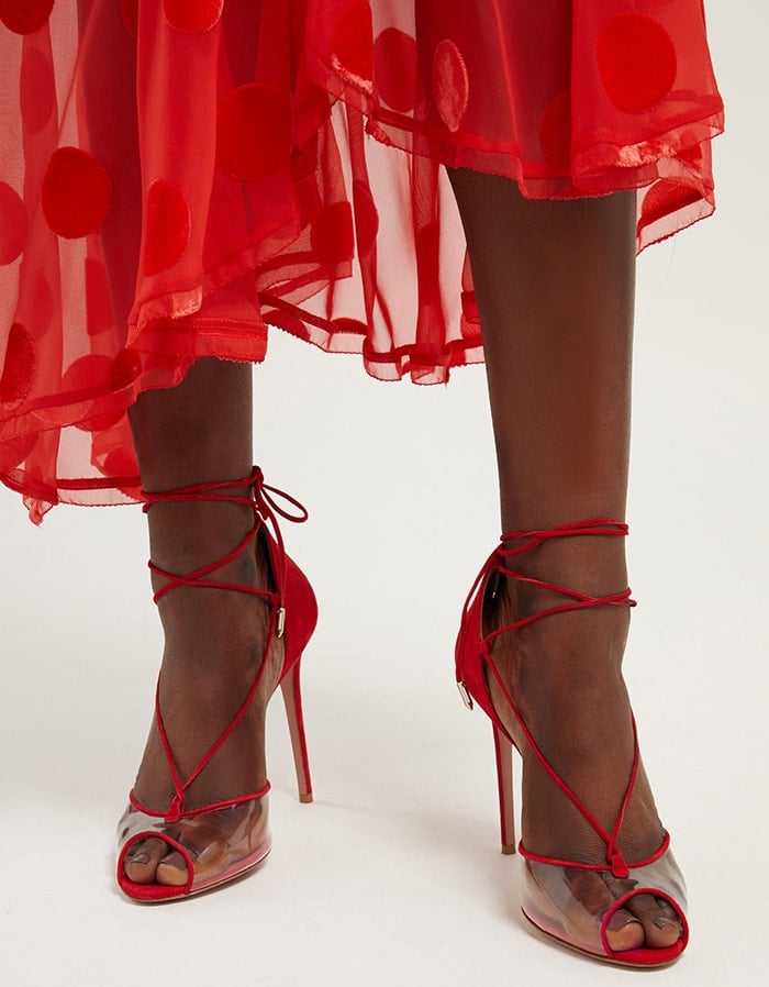 Slim leather laces wrap elegantly around the ankle and they sit on a graceful stiletto heel