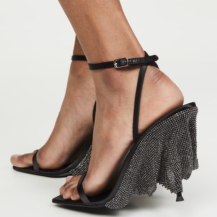 These strappy Blake sandals have an open square toe and dazzling crystals blanketing the heel