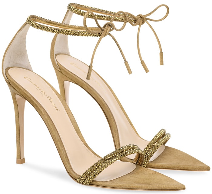 Made of iridescent gold suede, this pointy toe sandal is set on a 105mm solid heel