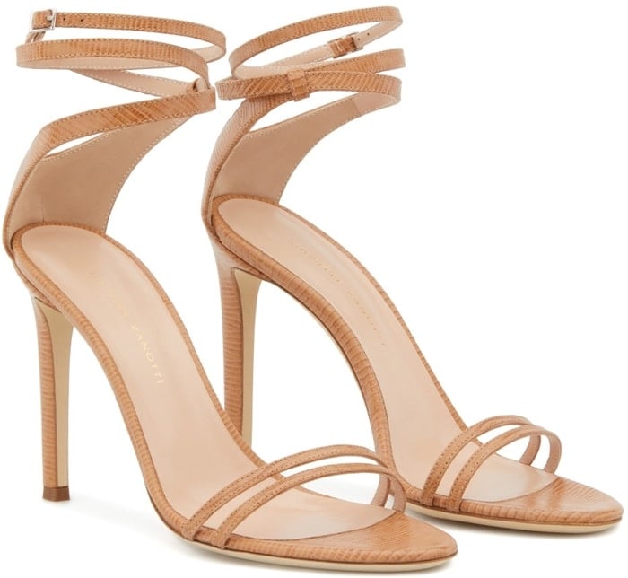 These high-heel, nude python-print leather Catia sandals feature a front strap formed by two thinner straps, and a wrap ankle strap