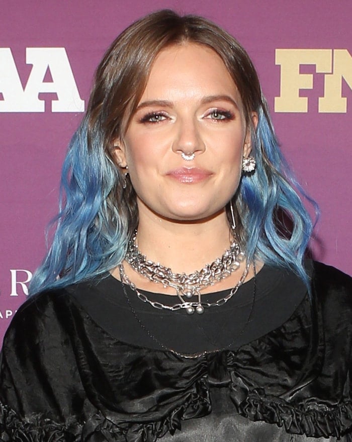 Tove Lo flaunts her septum ring and wears her dip dye blue hair in loose waves 