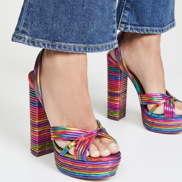 In a whimsical ombré-style rainbow finish, these sky-high platform sandals exude 70s-inspired charm