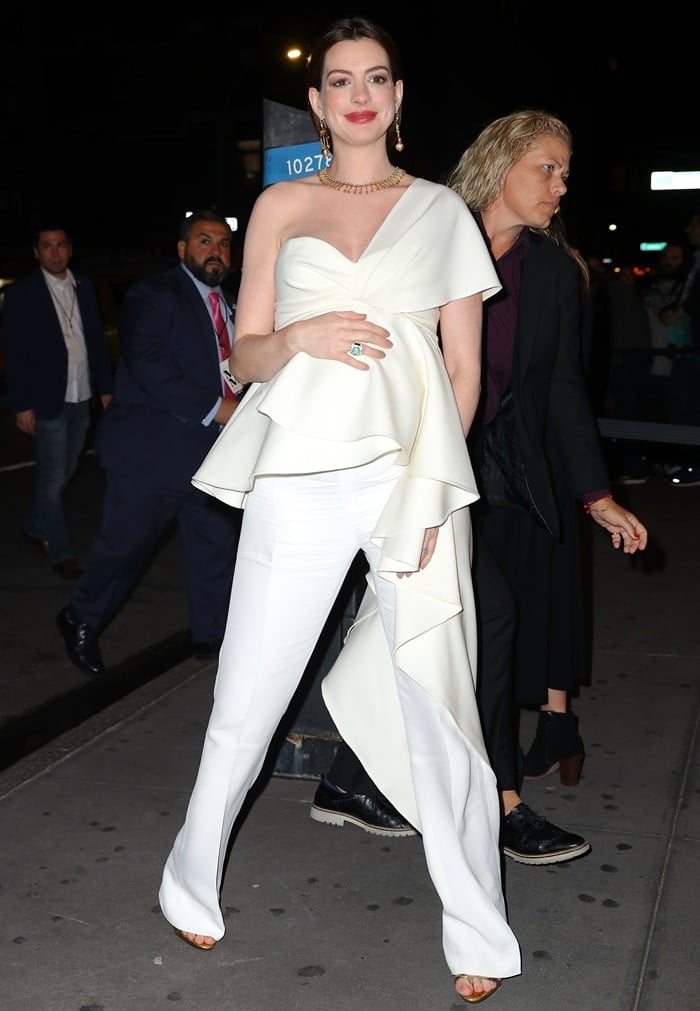 Anne Hathaway outside the Museum of Modern Love grand opening event