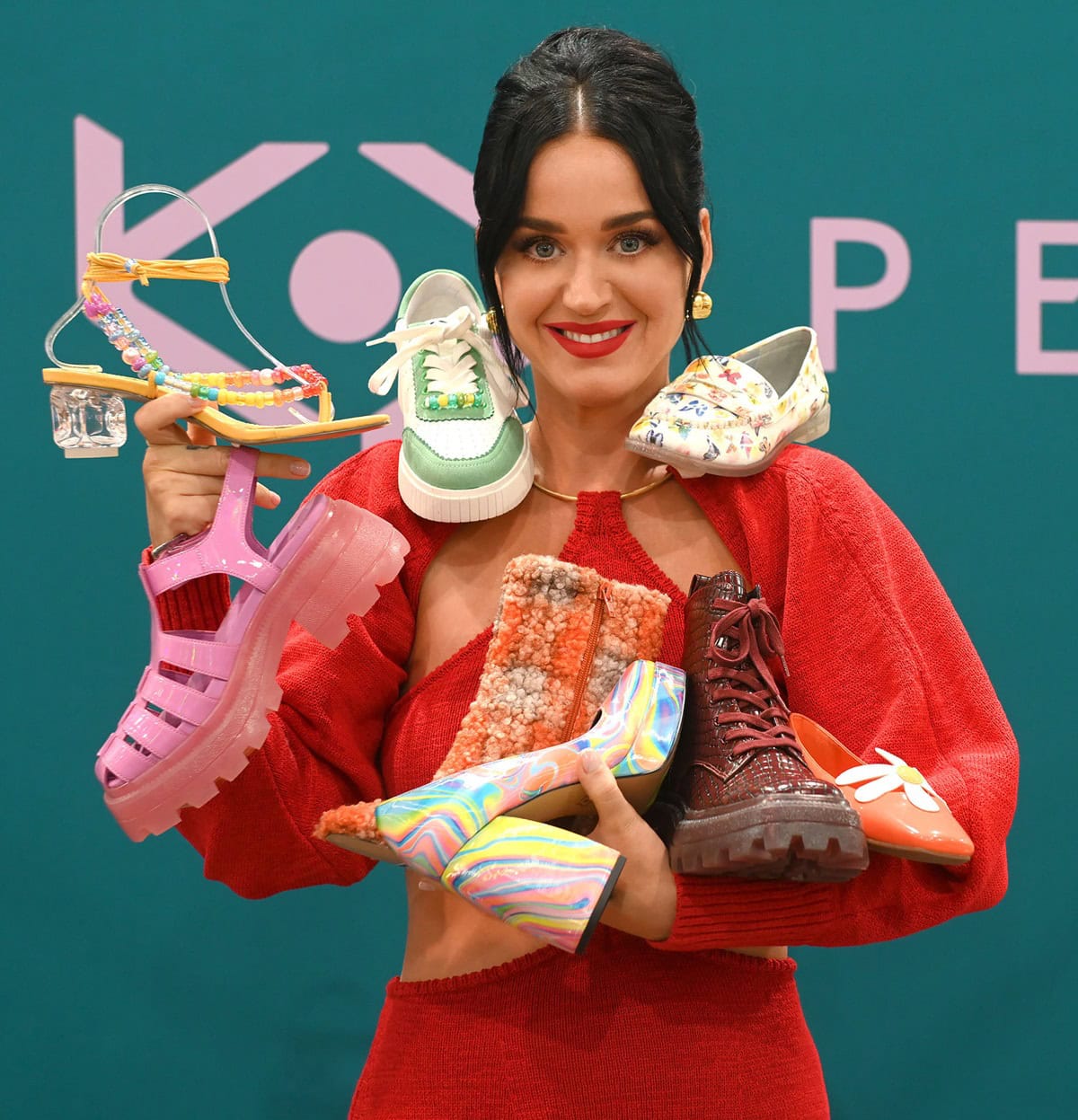 Katy Perry shows signs of a true shoe obsession as she proudly displays a playful assortment of colorful and quirky footwear from her Katy Perry Collections