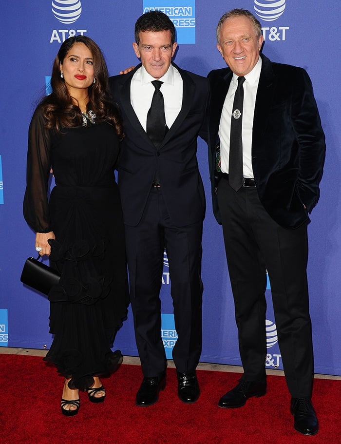 Salma Hayek, Antonio Banderas and Francois-Henri Pinault pose together at the 2020 Palm Springs International Film Festival gala