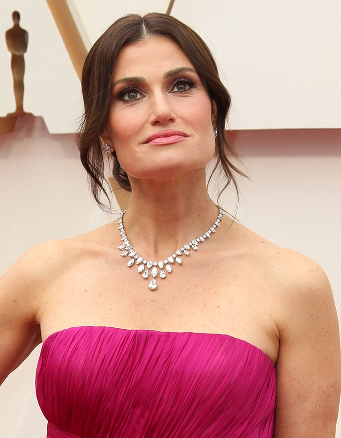 Idina Menzel's cascading diamond necklace and pirouette diamond earrings from Harry Winston