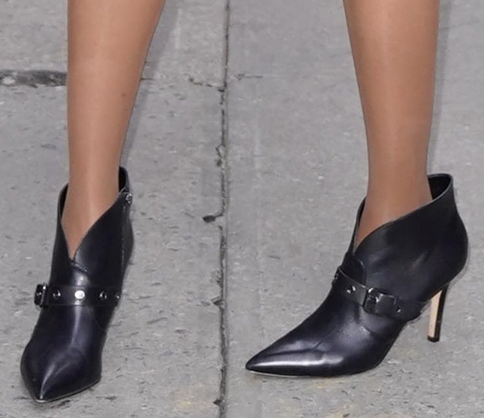 Tyra Banks slips into a pair of Nine West pointed-toe booties