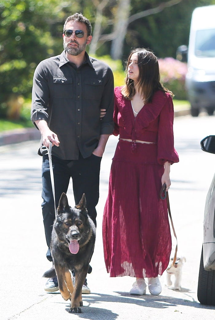 Ben Affleck and Ana de Armas arm-in-arm as they walk their dogs in Pacific Palisades on March 30, 2020