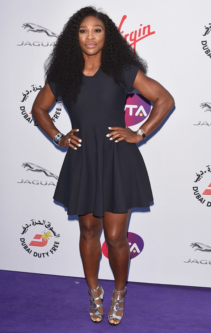 Serena Williams shows off her tall, athletic stature on the purple carpet at the WTA Pre-Wimbledon Party