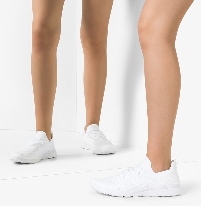 White TechLoom Breeze sneakers from APL: Athletic Propulsion Labs featuring a round toe, a pull-on style, a perforated style and a flat rubber sole