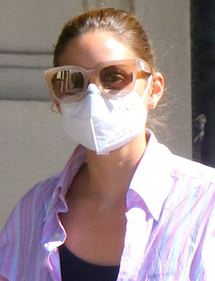 Olivia Palermo prevents coronavirus spread with a face mask