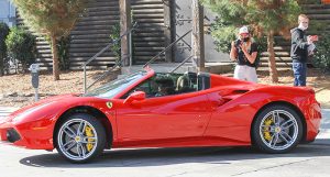 Vanessa Hudgens Drives Red Ferrari 488 Spider in Gymshark Leggings and