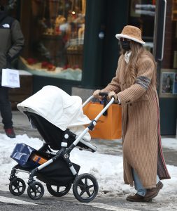 Gigi Hadid's Postpartum Style: Bugaboo Stroller and Dr. Martens Boots