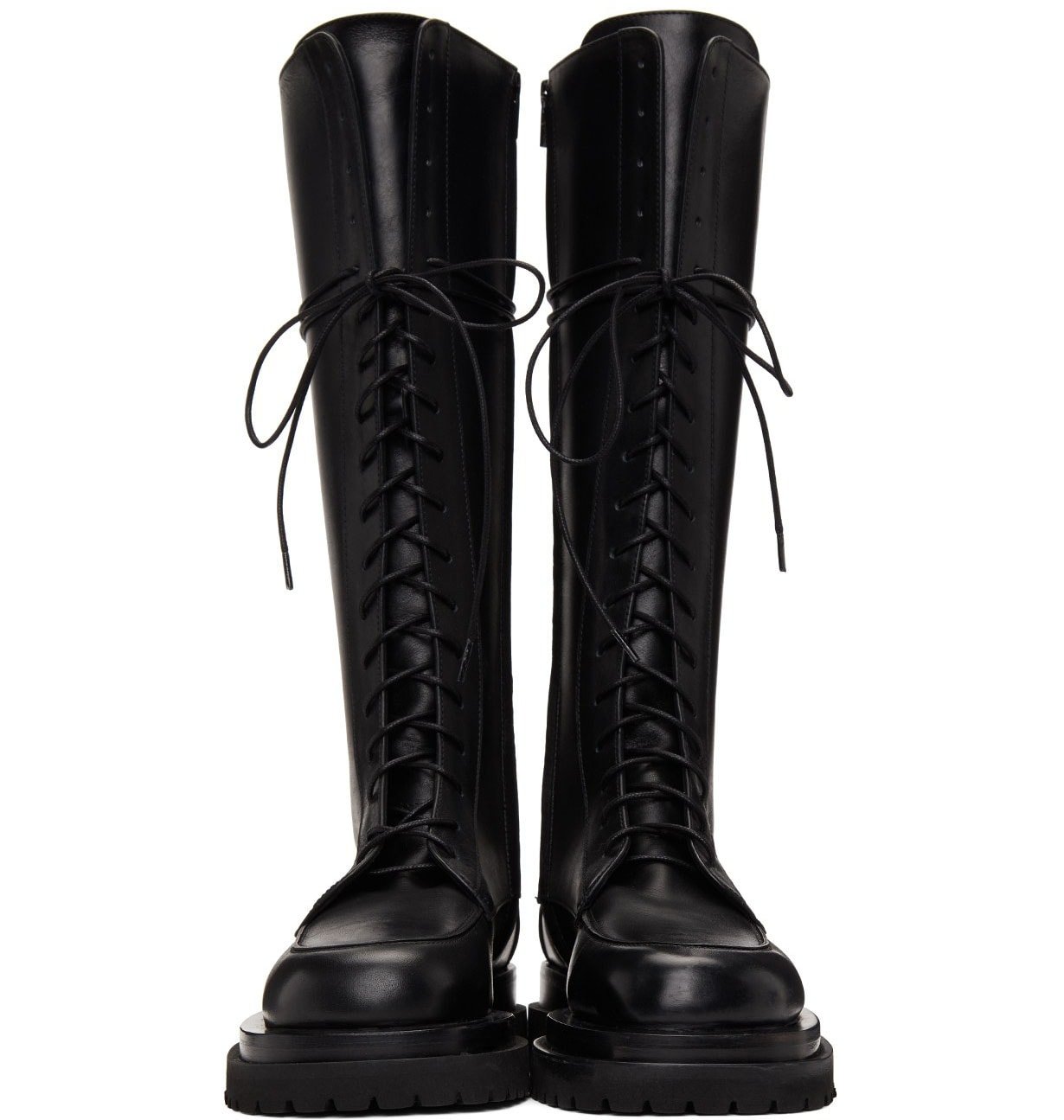 The Magda Butrym combat boots feature a lace-up fastening with ridged rubber platforms and heels