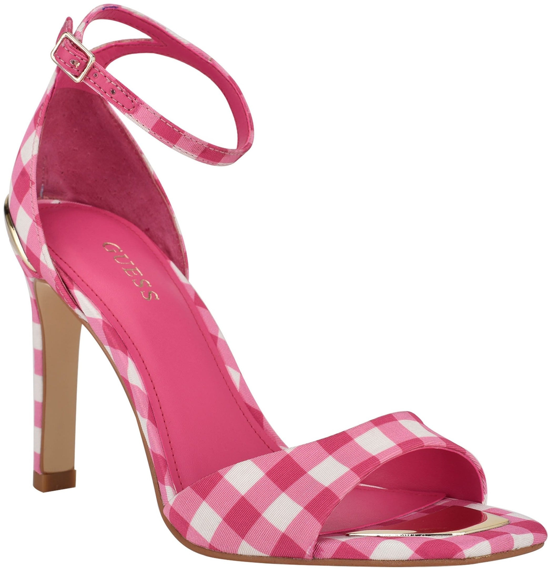 Stroll like a supermodel in this pink gingham dress sandal featuring an appealing logo metal rand and slim covered heel