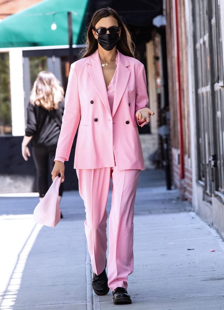 Irina Shayk Wears Hugo Boss Barbie Pink Suit and Dr. Martens 1460 Boots