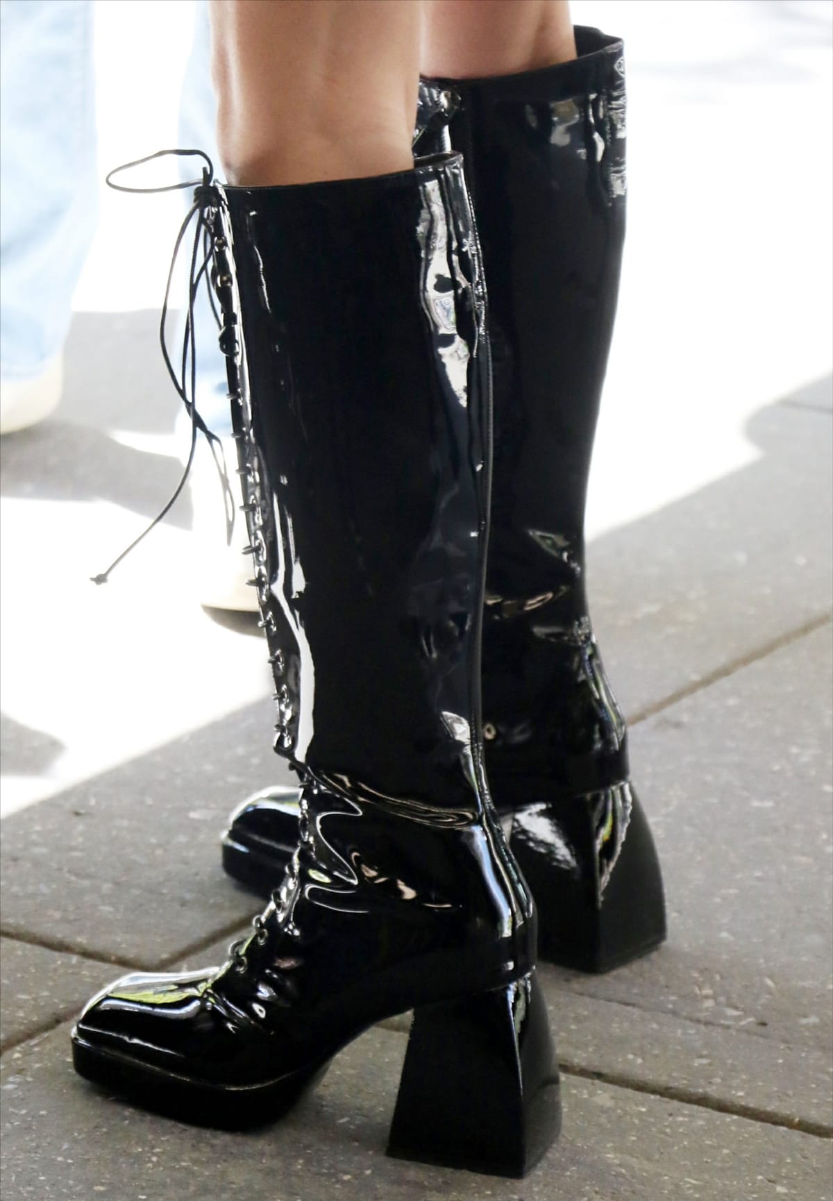 Olivia Rodrigo rocked a chunky pair of knee-high PVC boots