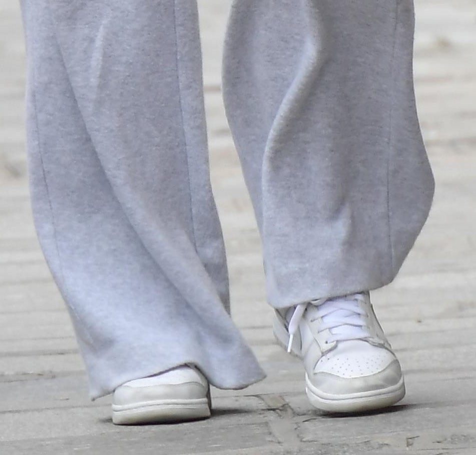 Sophie Turner completes her off-duty look with Nike Dunk Low Photon Dust shoes