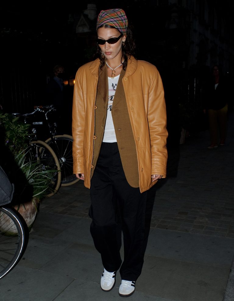 Bella Hadid Shops at Selfridges in Mustard Leather Jacket and Adidas ...