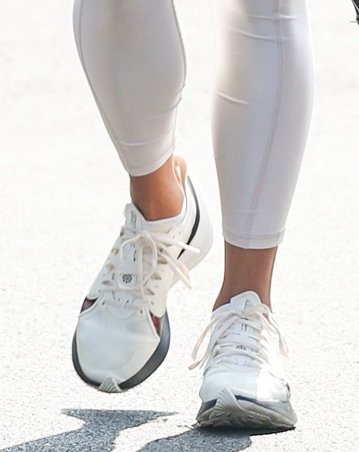 Vanessa Hudgens completes her monochromatic athletic outfit with Nike Zoom Gravity shoes