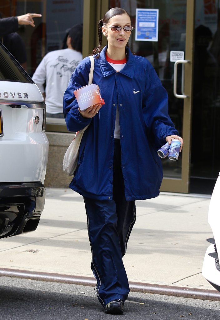 Kin Euphorics Co-Founder Bella Hadid Hands Drinks to Photographers in ...