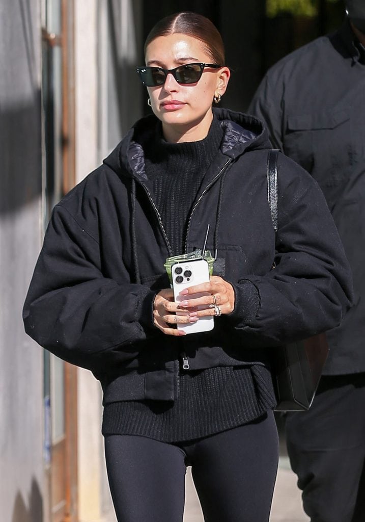 How Hailey Bieber Pairs Blazer and Hoodie With Ray-Ban Lady Burbank