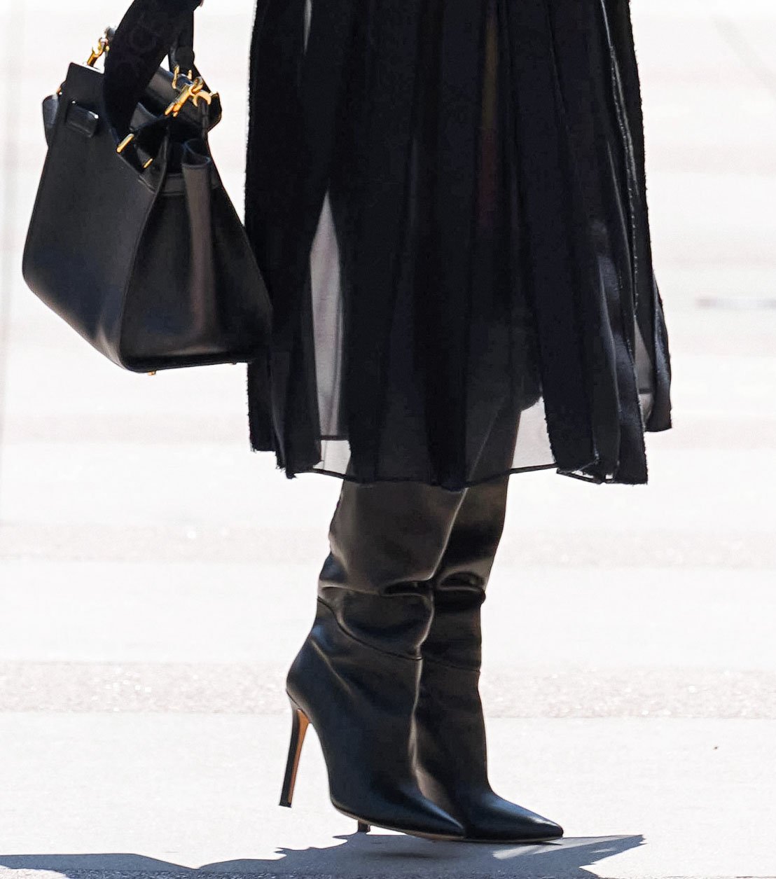 Heidi Klum completes her head-to-toe black look with Tamara Mellon Icon tall boots