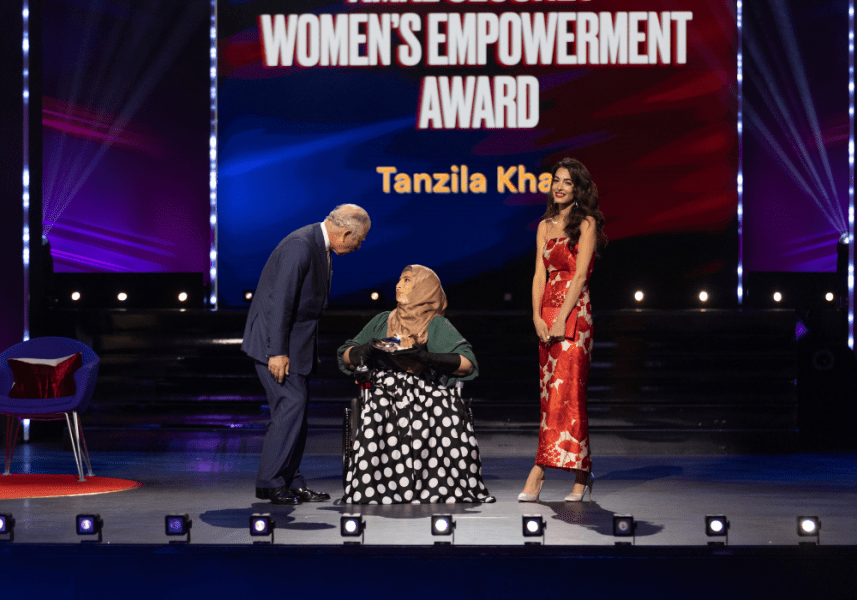 Prince Charles and Amal Clooney present the first-ever Amal Clooney Women’s Empowerment Award to Pakistani Tanzila Khan for her work on the menstrual hygiene app GirlyThings