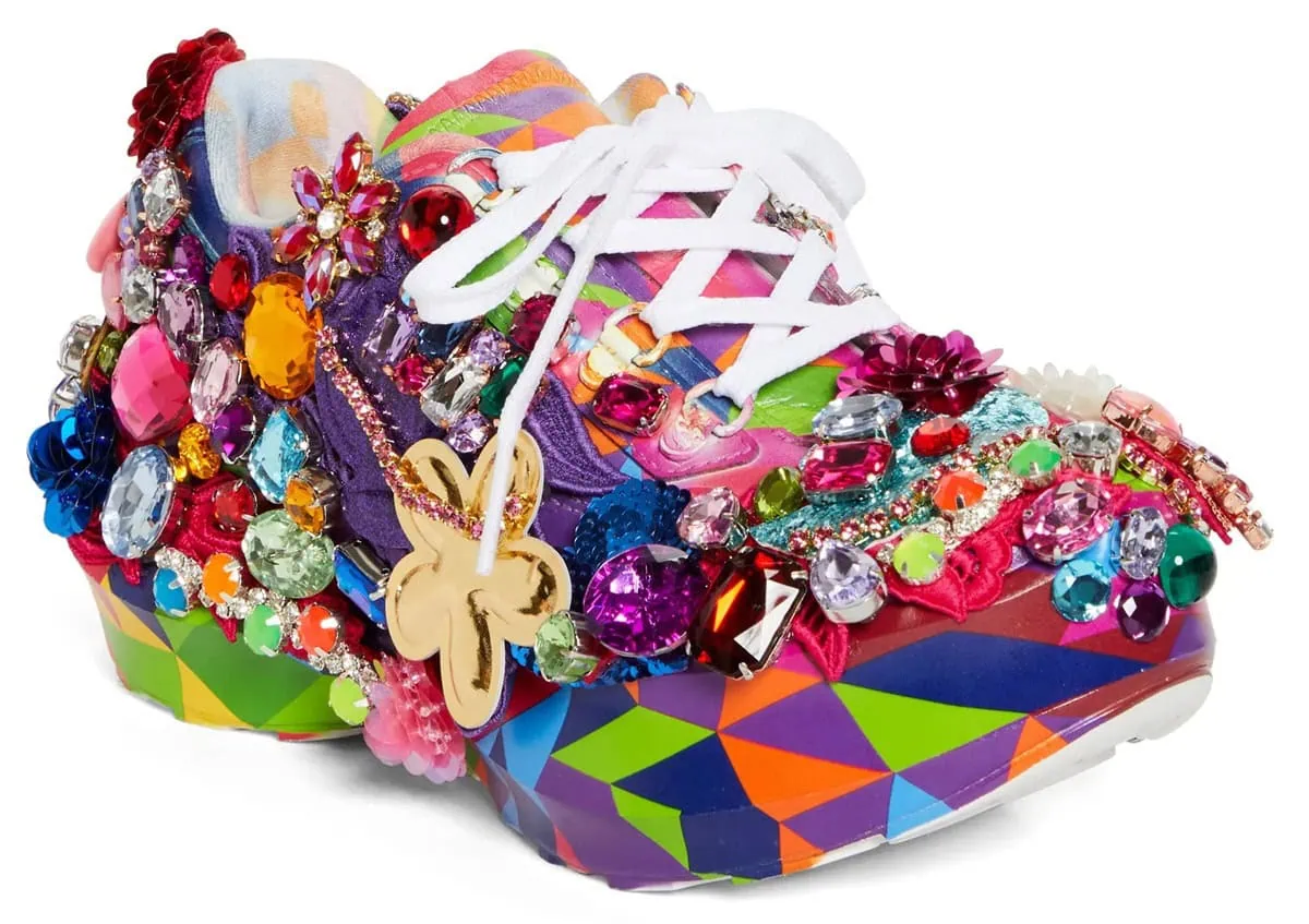 These dazzling SR811 platforms from COMME des GARÇONS x Salomon feature an explosion of vibrant gems and bold colors, epitomizing avant-garde fashion