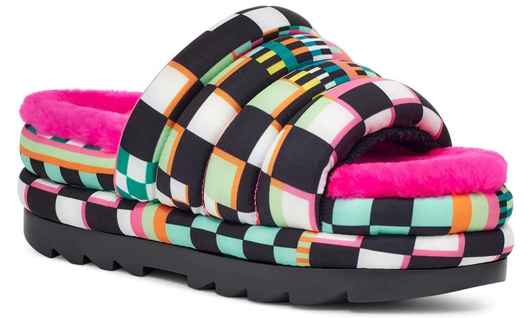 The statement UGG Maxi Checks slides boast a signature sheepskin insole and unique checkerboard mashup print