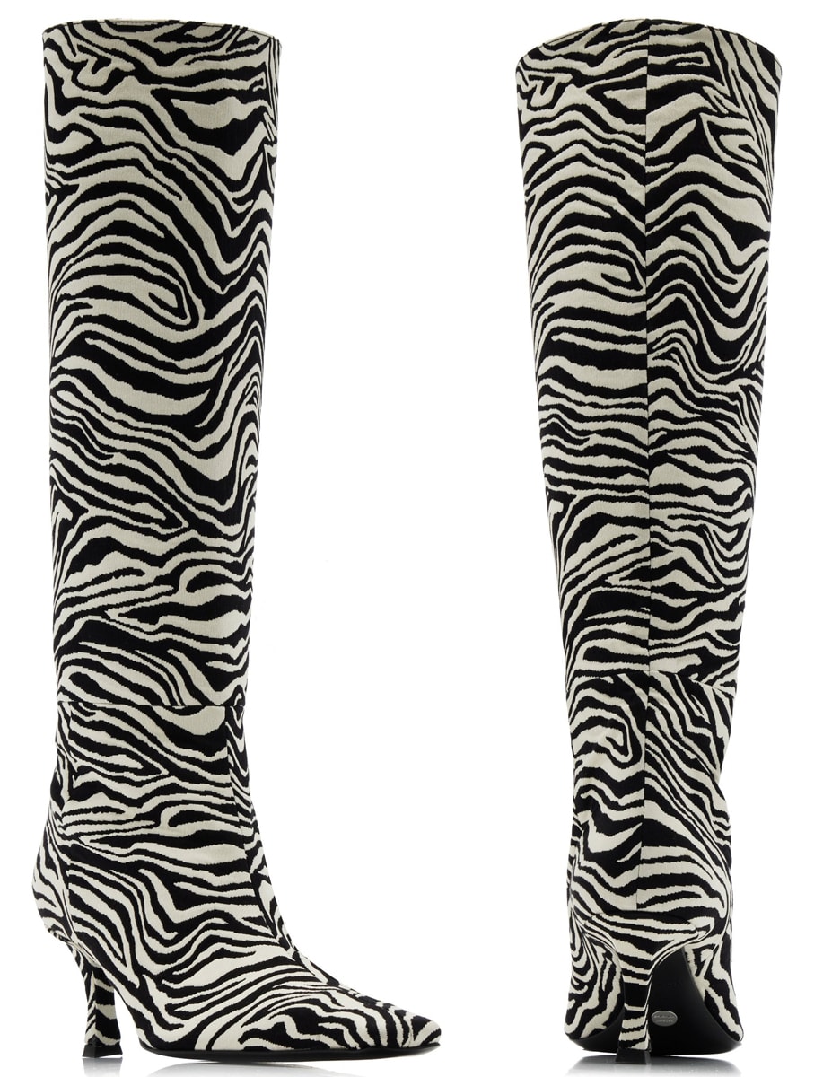 The Trap knee-high boots are made from zebra jacquard and feature pointed toes and kitten heels