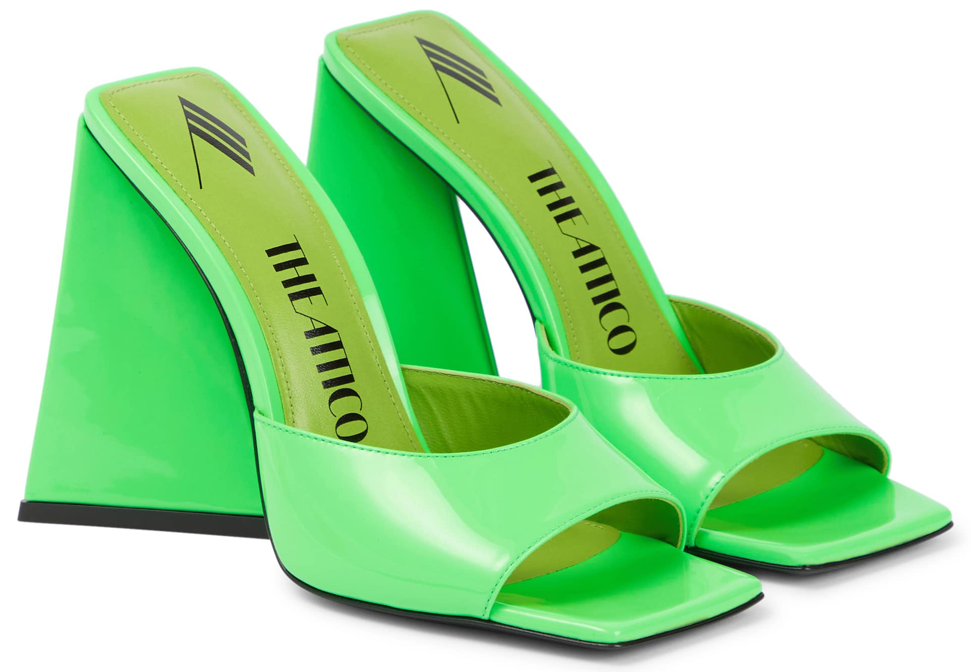 The Devon mules are crafted from neon green patent leather and feature pyramid heels and square open toes