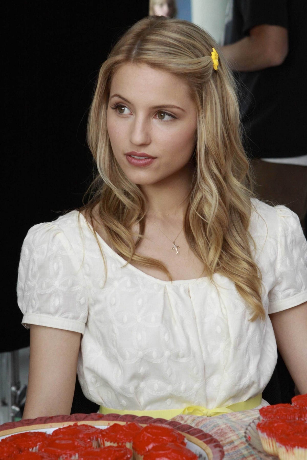 Dianna Agron captivates as Quinn Fabray in the beloved musical comedy-drama Glee, embodying the charm and complexity of the show's iconic cheerleader