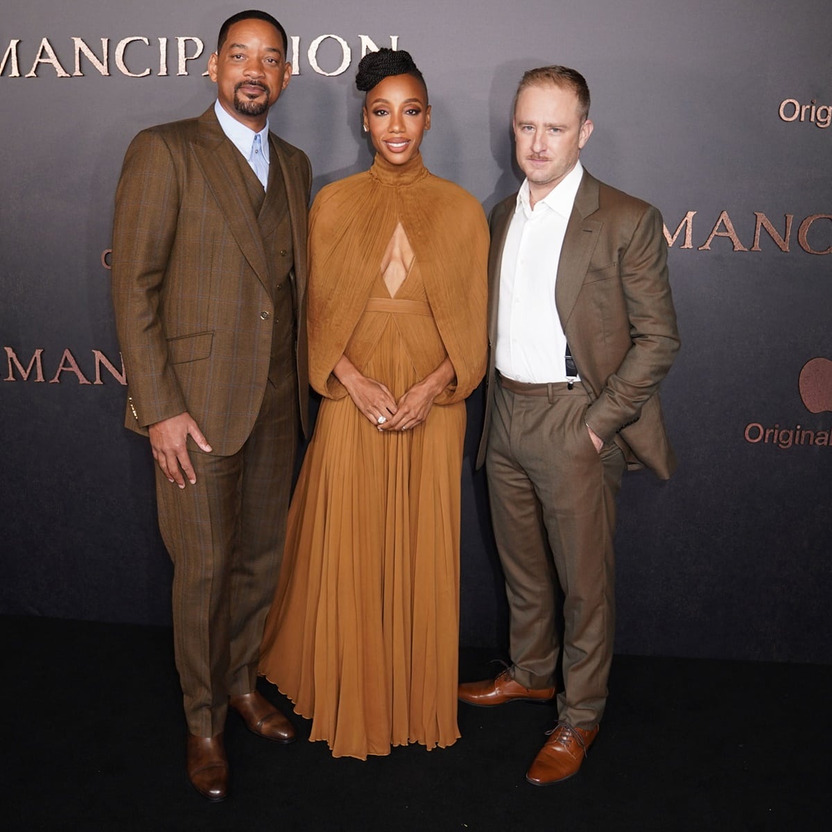 Will Smith in Dolce & Gabbana, Charmaine Bingwa in Cong Tri, and Ben Foster in Brioni for the premiere of Emancipation held at Regency Village Theatre in Los Angeles