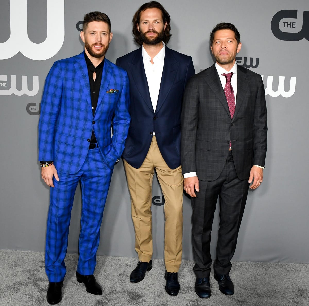 Jared Padalecki towering over Supernatural co-stars Jensen Ackles and Misha Collins at the 2019 CW Network Upfront