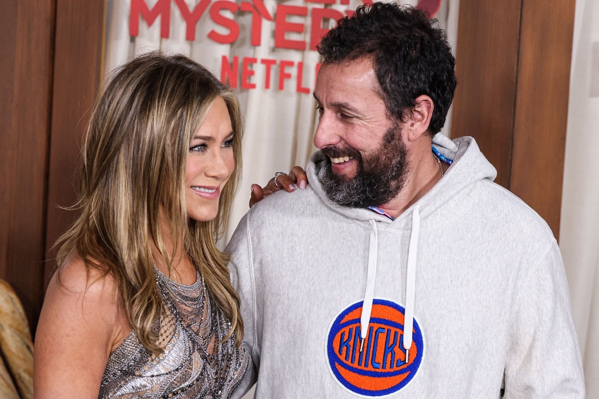 Jennifer Aniston Reacts to Adam Sandler in Sweatshirt at 'Murder Mystery 2'  Premiere