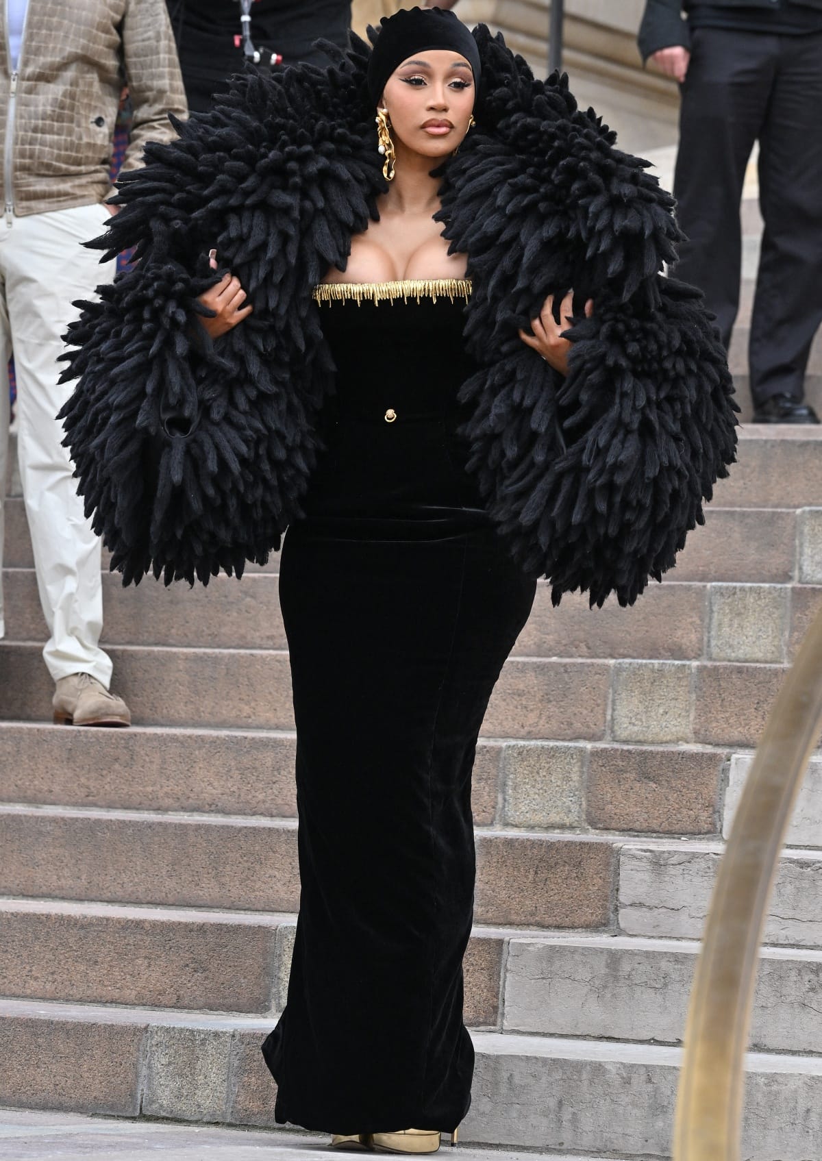 Cardi B making a dramatic entrance in a custom ensemble at the Schiaparelli Haute Couture Fall/Winter 2024 show during Paris Fashion Week