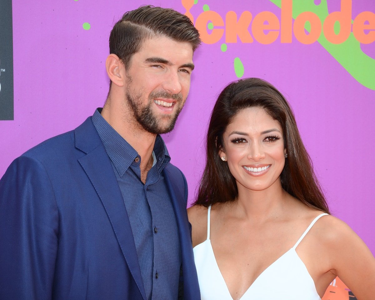 Michael Phelps and Nicole Johnson, pictured at the 2017 Nickelodeon Kids' Choice Sports Awards, began dating in 2009 but separated in 2012 as they both needed time to grow and discover themselves