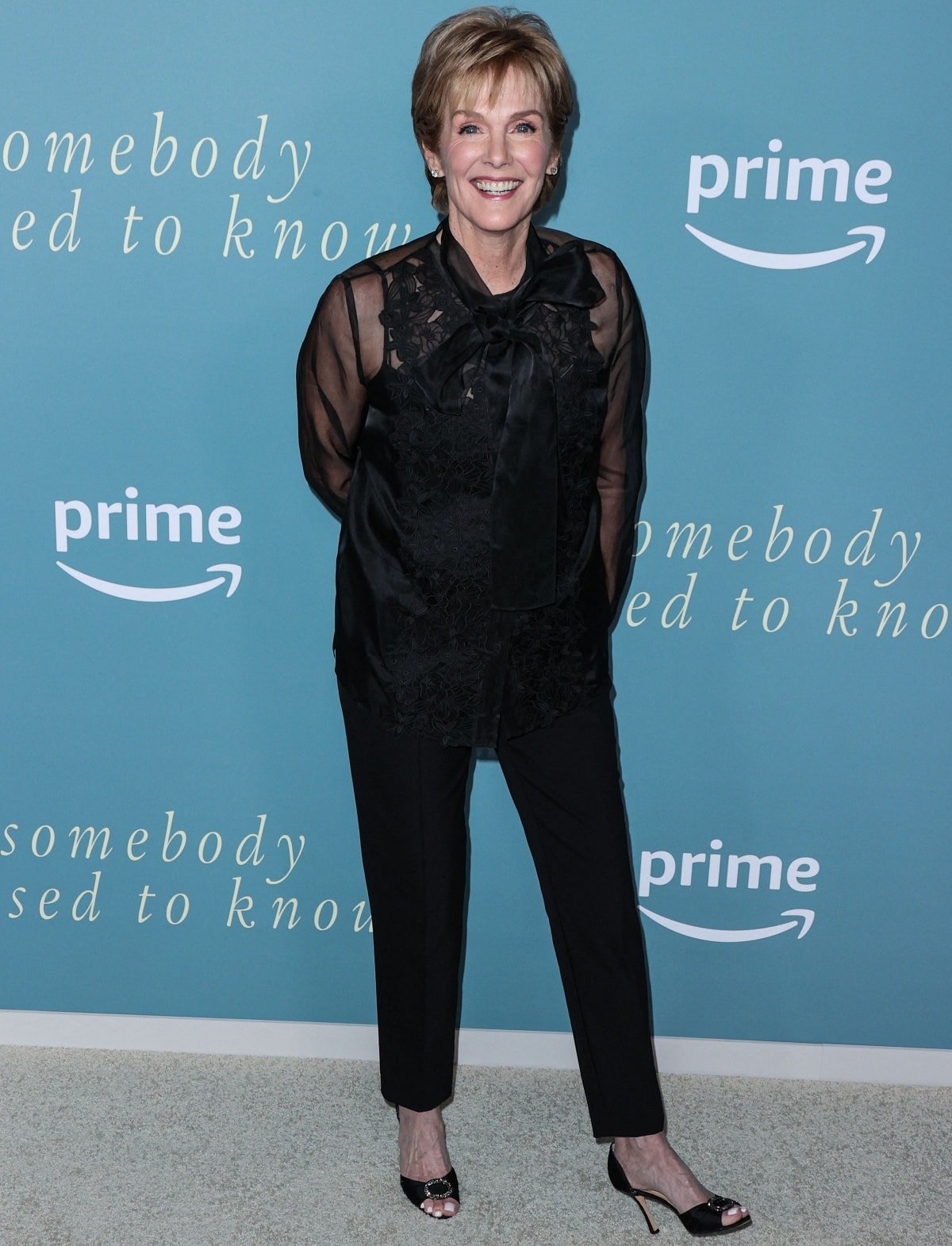 Julie Hagerty wearing open-toed heels for a stylish boost at the premiere of Somebody I Used to Know