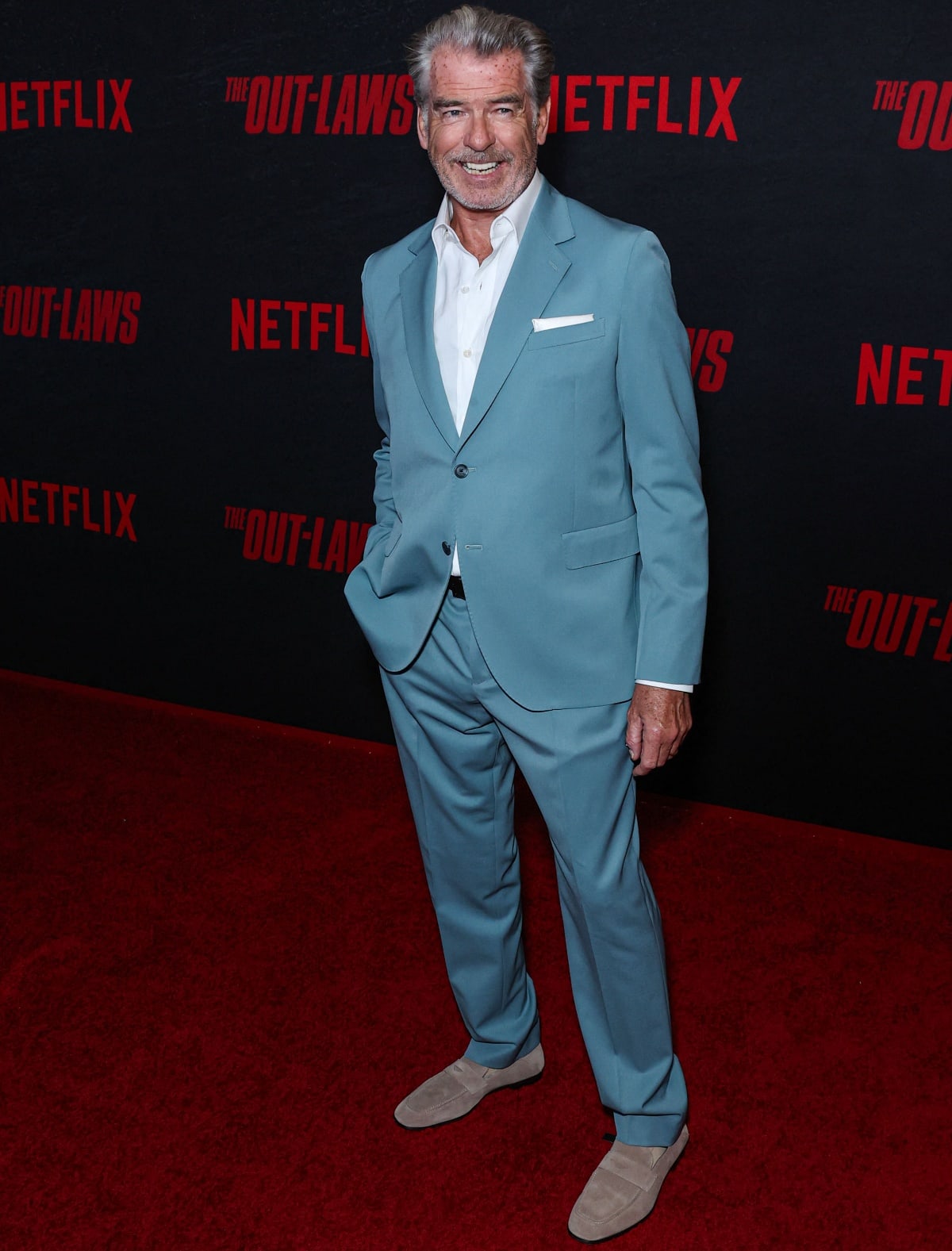 Pierce Brosnan suited up for the premiere of The Out-Laws