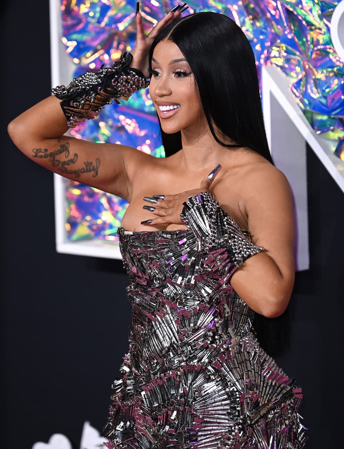 Cardi B wore a mesmerizing armor dress constructed from thousands of hair clips, a bespoke piece by Dilara Fındıkoğlu