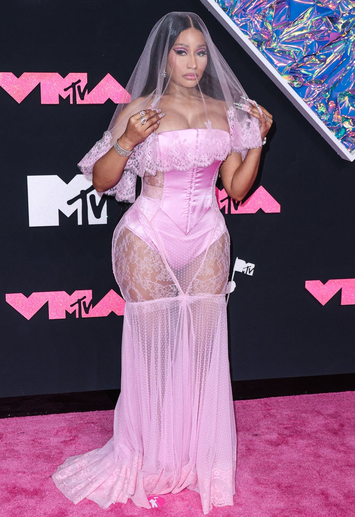 Nicki Minaj Embraces Barbie Bridal Look With Lacy Dolce Attire