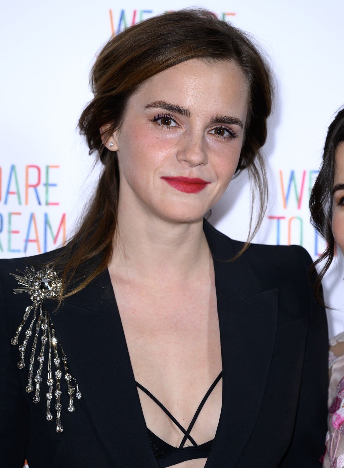 Emma Watson embraces the shirtless blazer trend at the We Dare to Dream London premiere at Cineworld on November 26, 2023