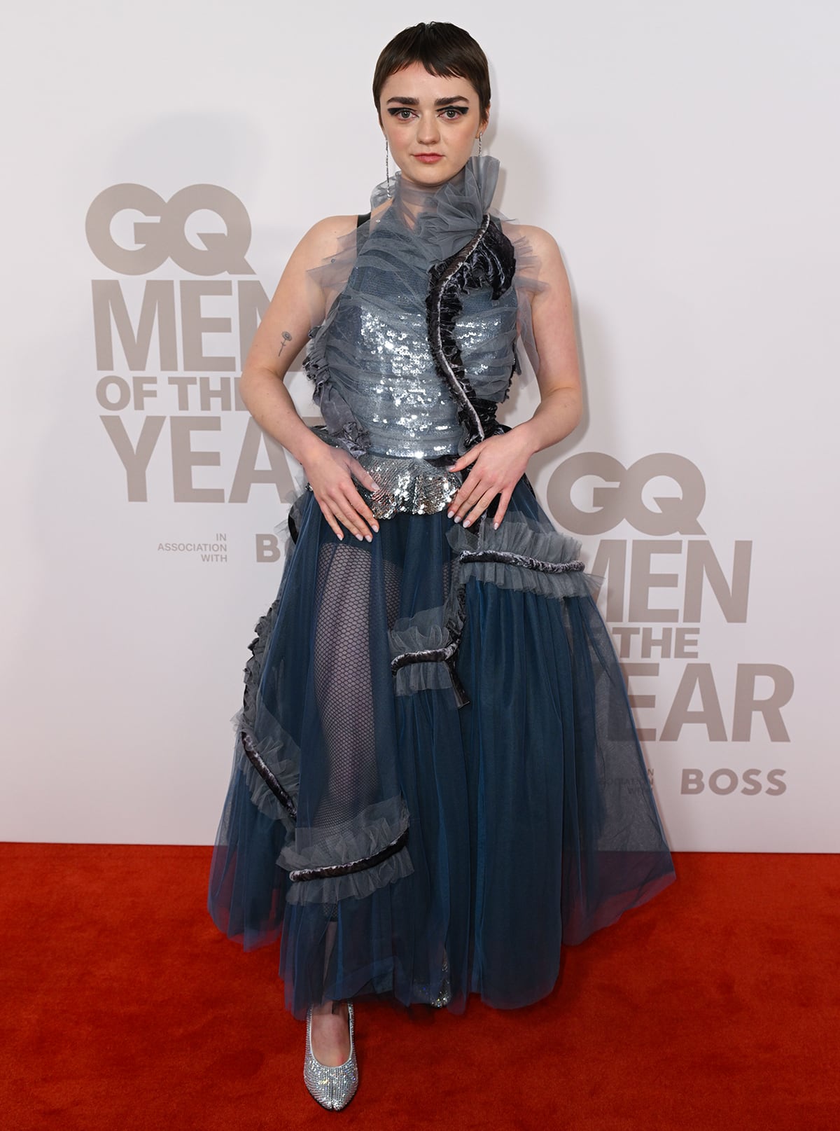 Maisie Williams pulls off her botched arts and crafts project look featuring a deconstructed blue and gray tulle gown from Maison Margiela's Co-Ed 2023 collection