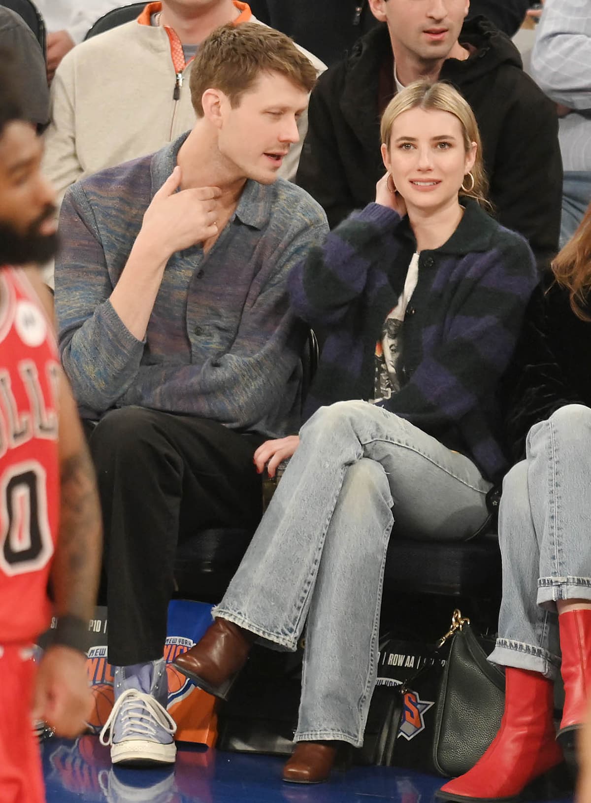 Emma Roberts with her boyfriend Cody John at the Chicago Bulls vs. New York Knicks basketball game at Madison Square Garden on January 4, 2024