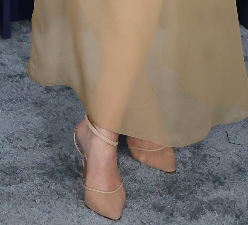Joey King teams her quirky black and beige gown with nude sheer Andrea Wazen Denver pumps