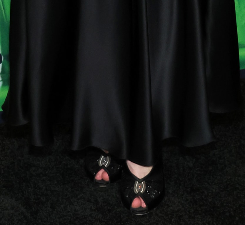 Kirsten Dunst teams her Rodarte dress with black embellished Ferragamo peep-toe pumps