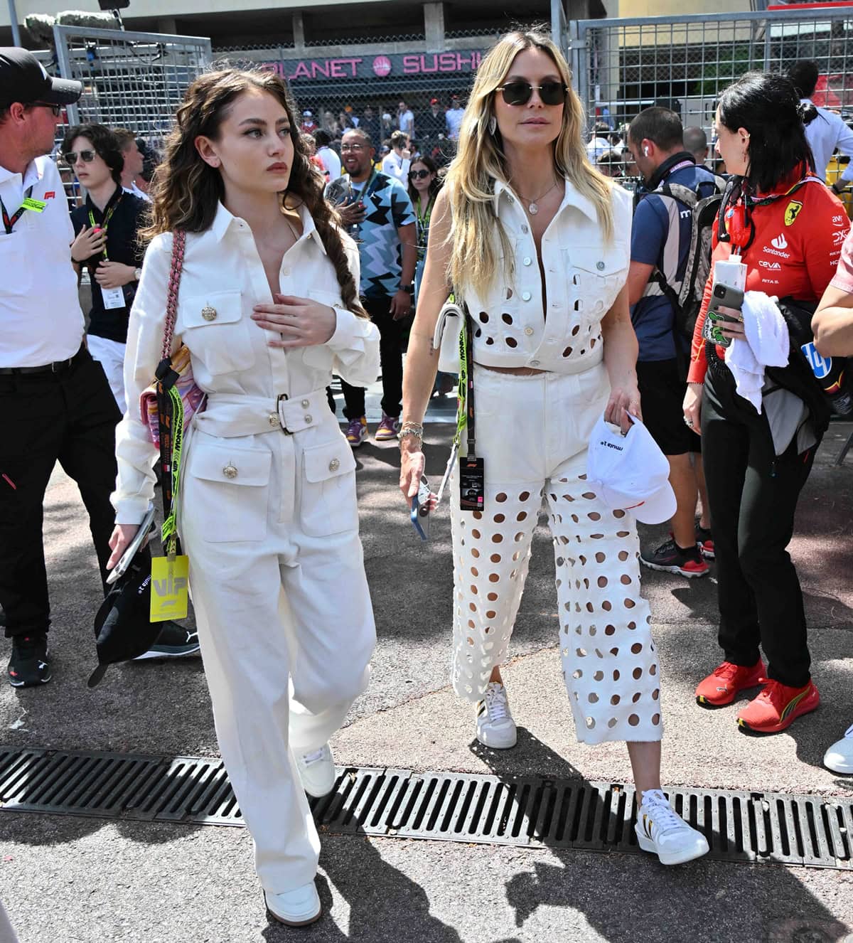 Trading high-fashion statements for casual looks, Heidi and Leni Klum head to the races in coordinating all-white outfits, perfect for the start of summer, at the Formula One Grand Prix of Monaco